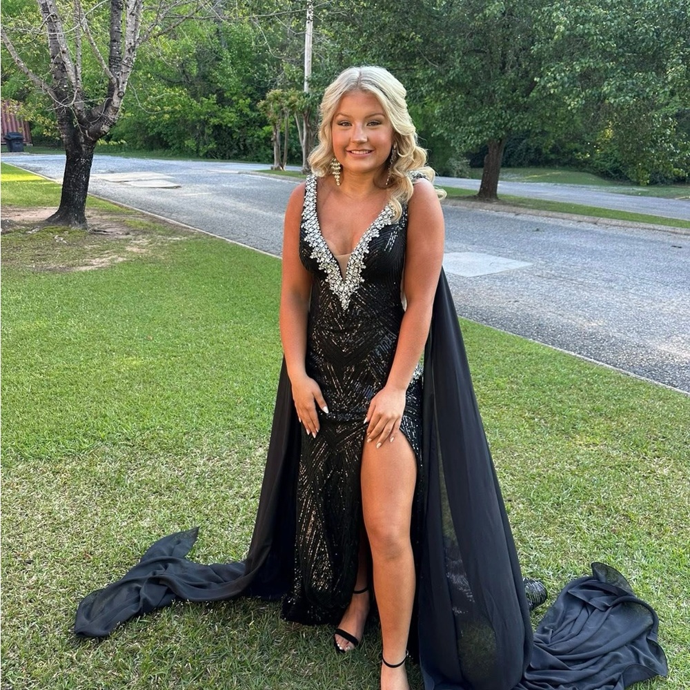 Ava Presley Elegant Black Gown with Silver Embellishments